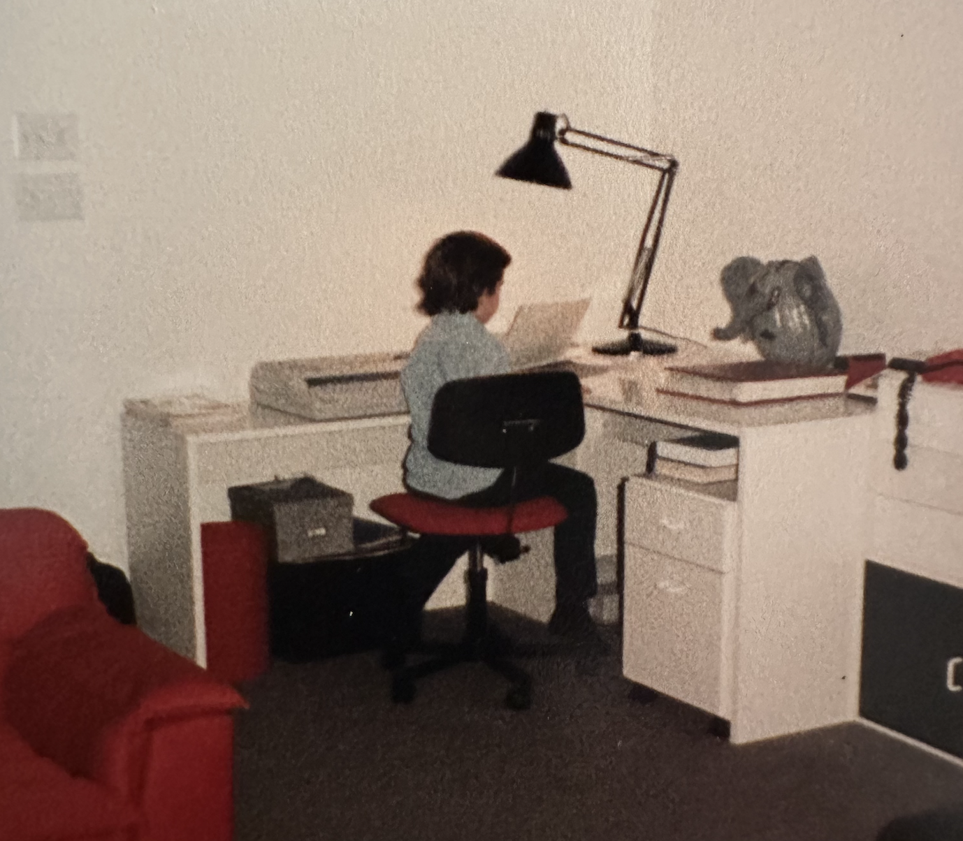 Brian Abrams as a child at a desk